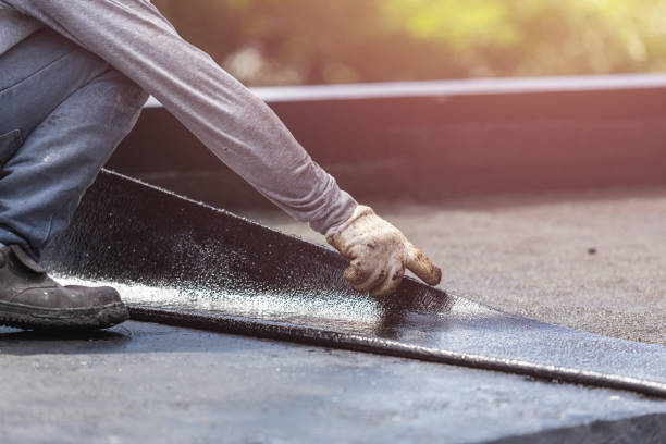 Professional Basement Waterproofing technician working in Kempton, IN